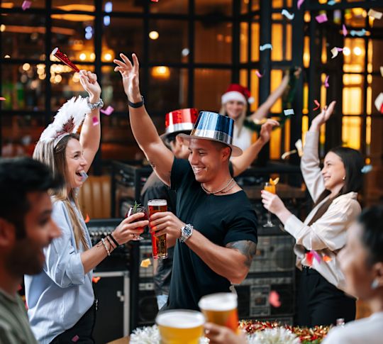 McGettigan's people celebrating with themed hats