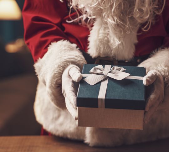 Santa holding present