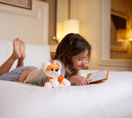 Kid of bed reading
