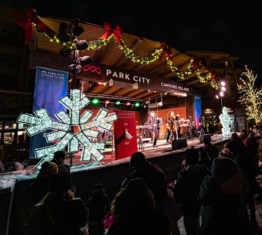People Attending a Concert at Park City during Christmas