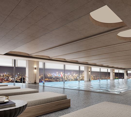 Indoor pool overlooking a city skyline