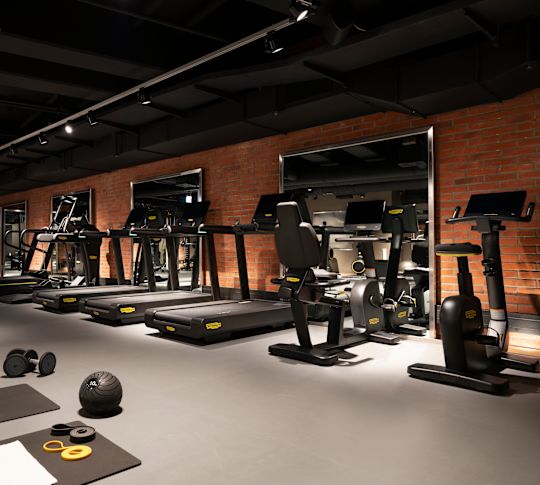Treadmills, Elliptical Machine and Weights in a Fitness Center