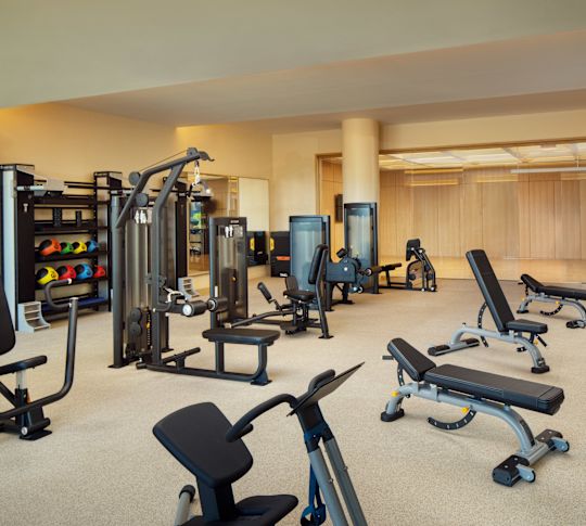 Fitness Center with Treadmills and Other Modern Equipment