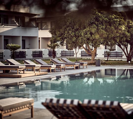 Large Outdoor Pool with Lounge Chairs