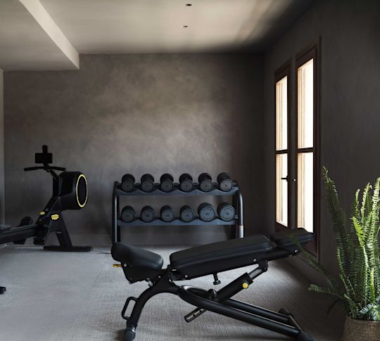 Fitness center with bench and free weights