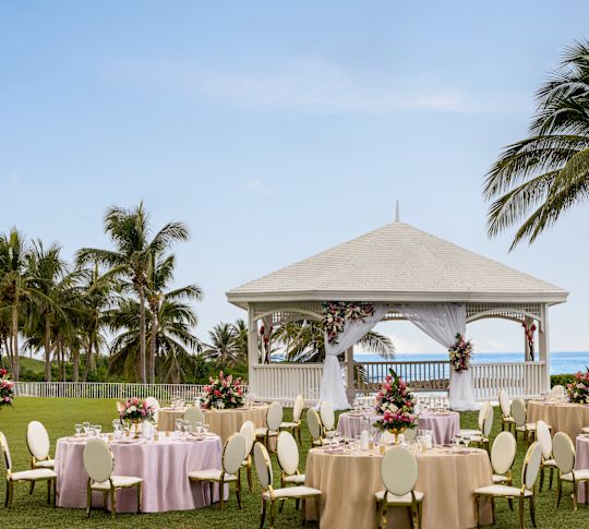 Gazebo and Tables Setup Outdoors for a Celebration with Water View