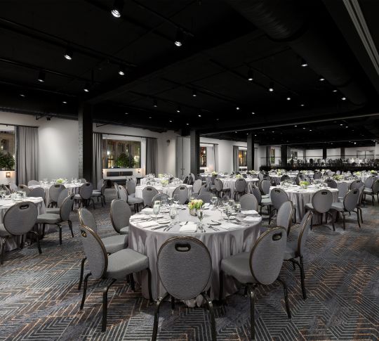 Avenue 34 meeting room with tables and chairs