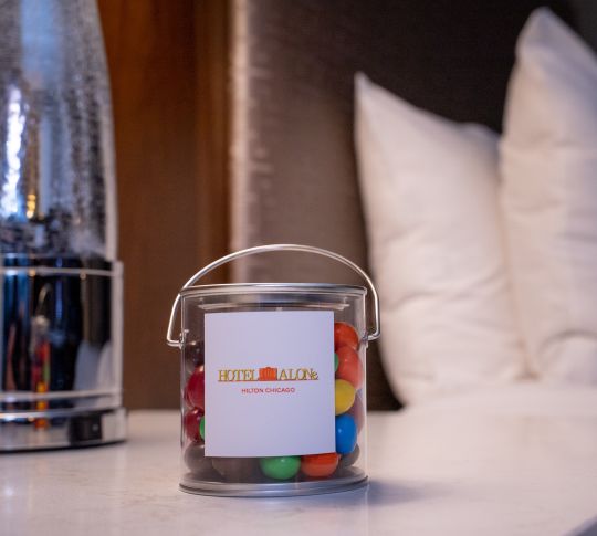 Detail of candies on a guest room nightstand