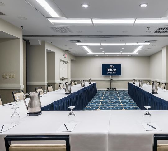 Meeting room with tables and chairs