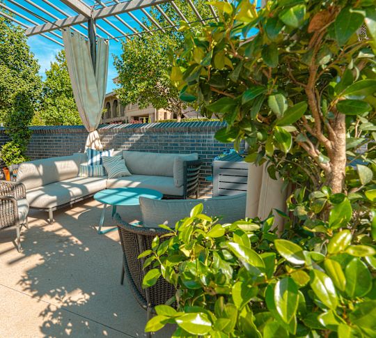 Shady and Comfortable Seating Area in a Courtyard at Jade Waters Water Park
