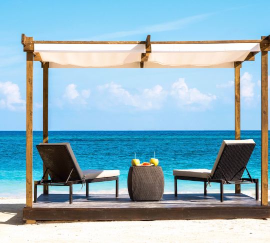 Beach seating area with drinks