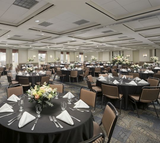 Ballroom setup with round tables for reception