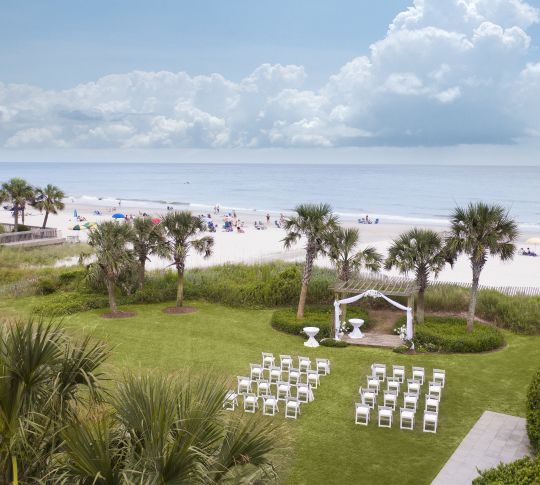 Outdoor Wedding Venue on Lawn with Beach View