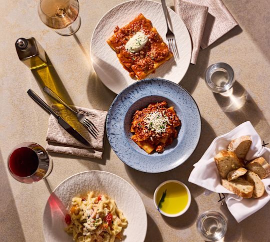 Trabucco restaurant, dinner entrees, glasses of wine