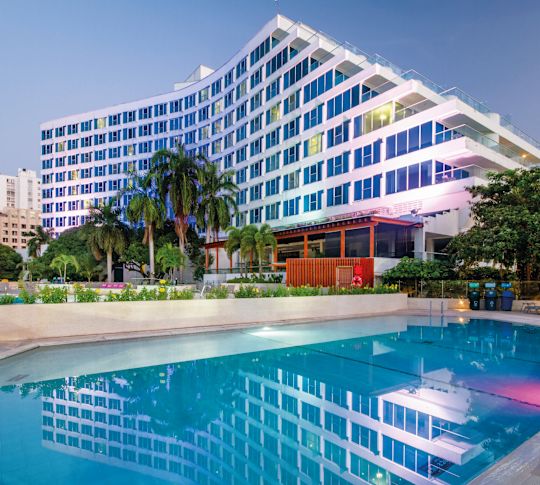 pool of water in front of large building