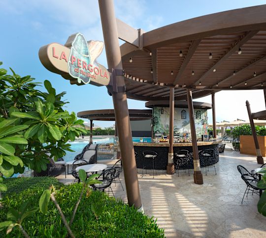 La Pergola Pool Bar during daytime-transition