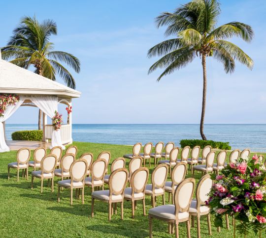 Garden overlooking ocean setup for wedding ceremony