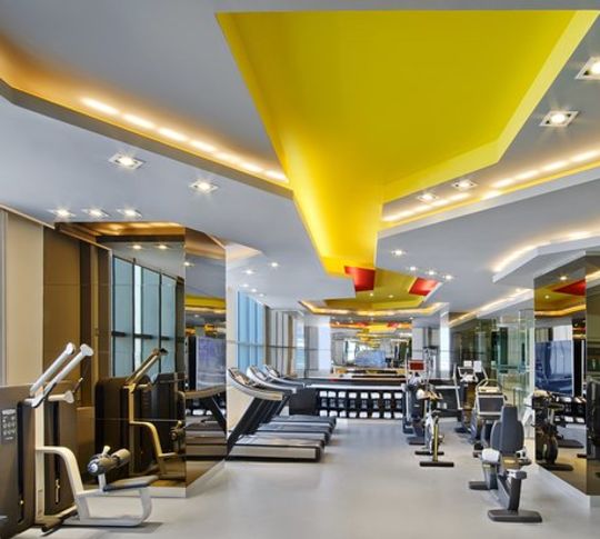 Treadmills and elliptical machines in the fitness centre