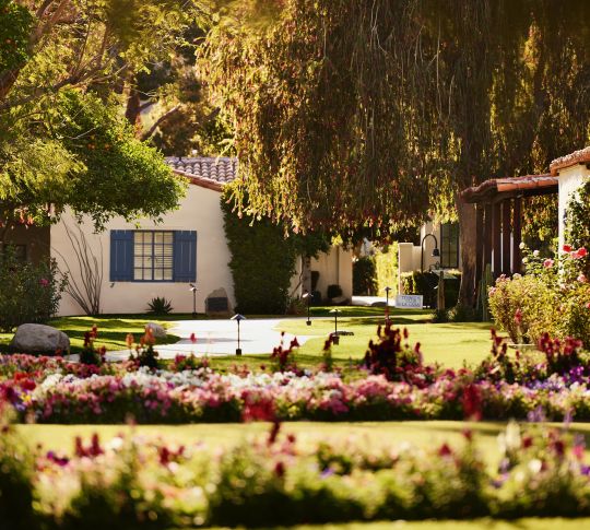 Exterior shot with gardens and flowers
