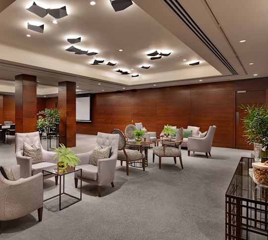 meeting space with lounge area and boardroom table