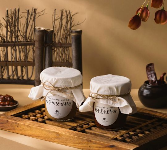 Afbeelding van Jang Set op een houten plank