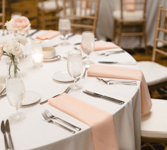 Ballroom Setup Flowers and Candles on Round Tables  for Dining at a Wedding Celebration-transition