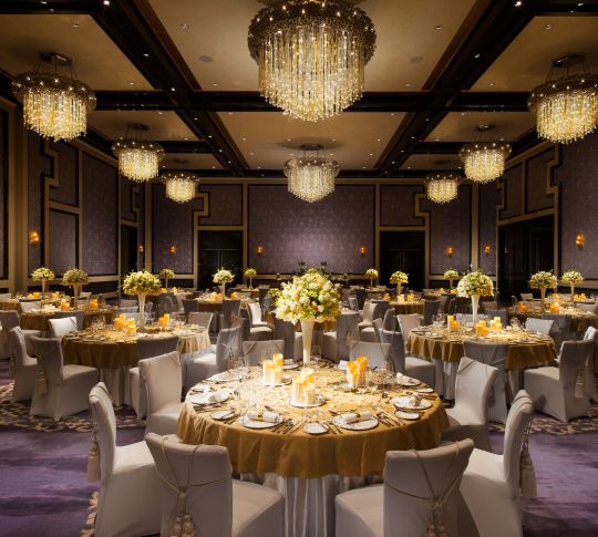 Spacious Grand Ballroom with Round Tables and Chairs
