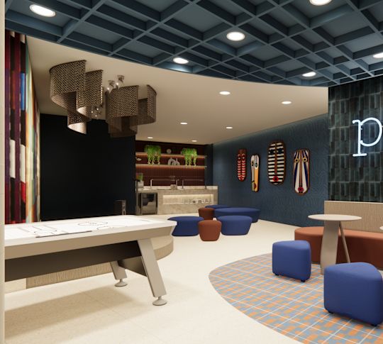 Play area with table, comfortable seating and plants