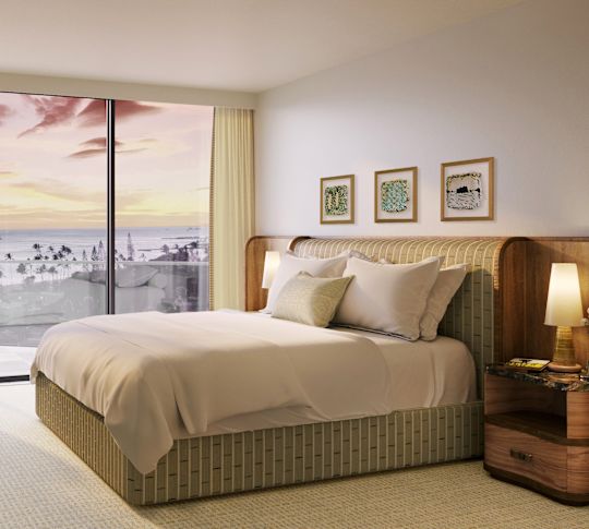 Bed and Armchair in a Guest Room with Large Windows-transition