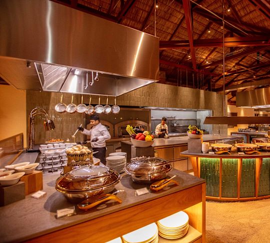 Chef Preparing Food at Atoll Market Restaurant