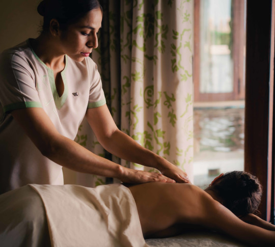 Woman receiving spa treatment