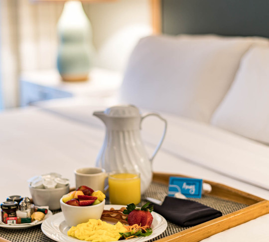 Room service, with tray on bed