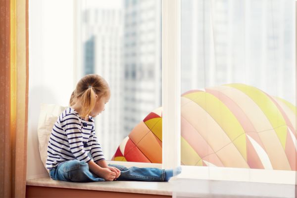 Little girl look at balloon
