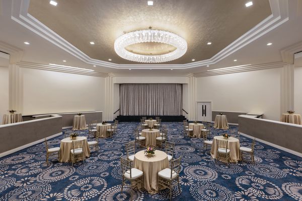 meeting room with round tables and banquet setup