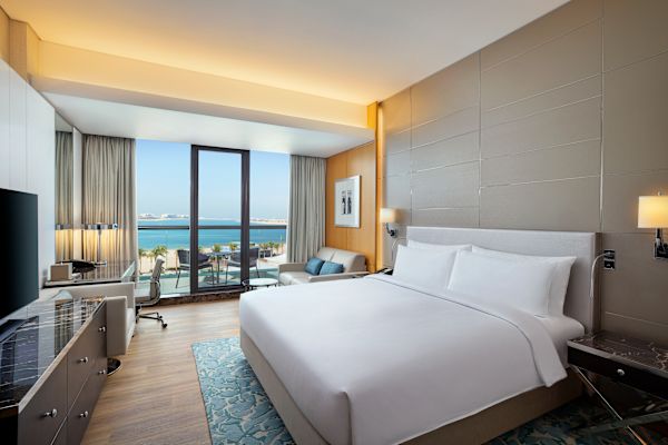 King bedroom with palm view