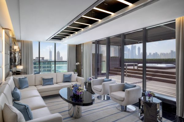 Presidential suite seating area with L-shaped sofa