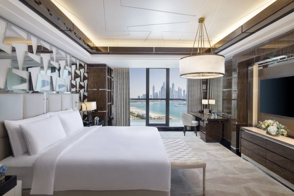 Royal suite master bedroom with wall mounted TV