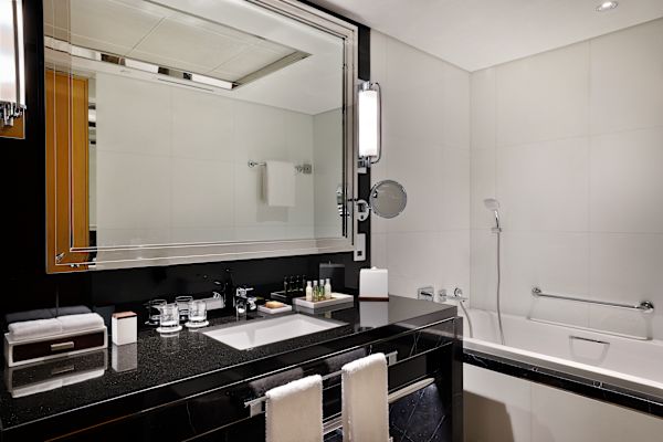 Bathroom vanity and bathtub