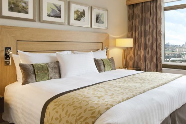 Mayfair Suite Bedroom with bed and view from window