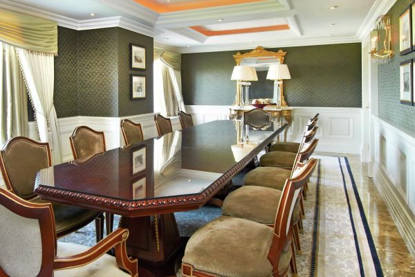 Presidential Suite Dining Room With Table and Chairs