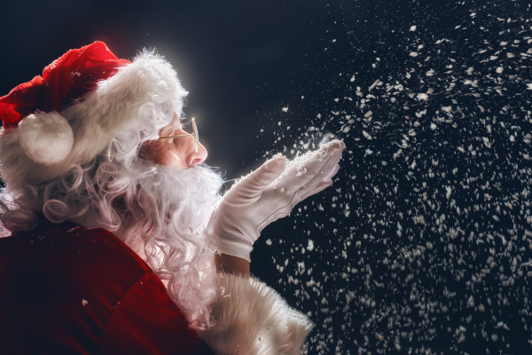 Christmas - Santa blowing snow