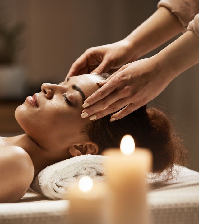 Woman receiving spa massage