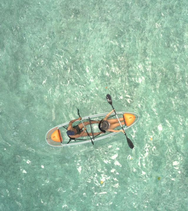 People in a Kayak on the Water