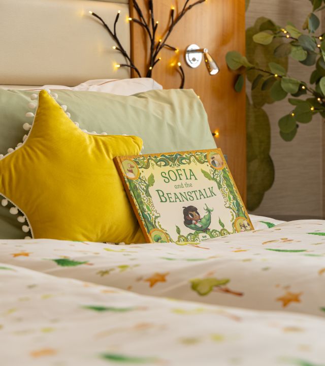 Close-up of pillow with story book