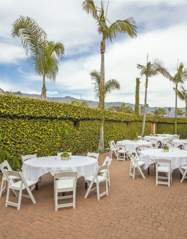 outdoor event space with round tables