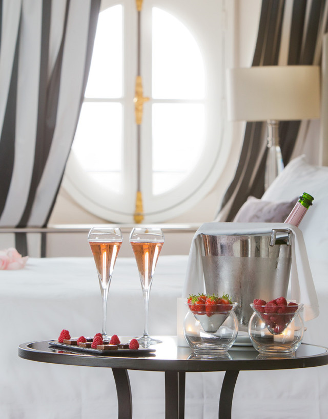 champagne and berries in guest room