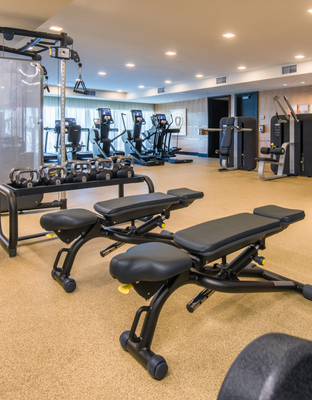 Fitness center with benches and free weights