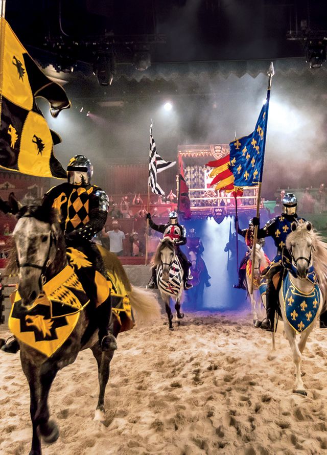 Midievil Times, knights riding horses carrying flags