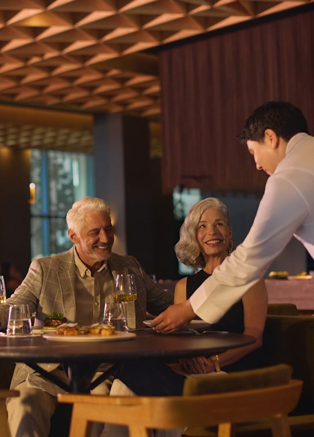 Couple enjoying meal in restaurant