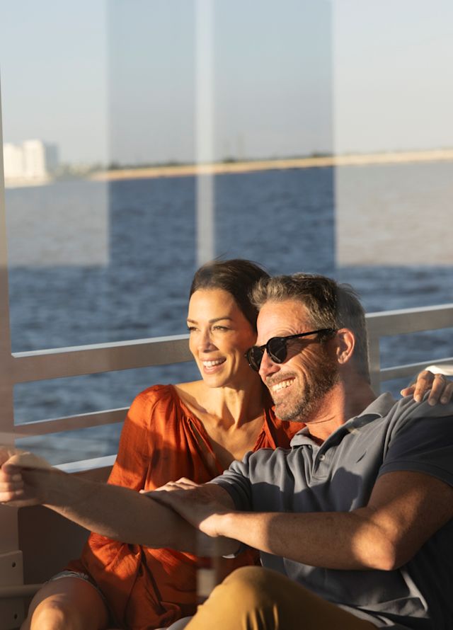People Enjoying a Water Cruise